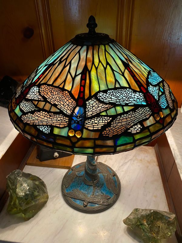 Description:
This is a Dragonfly table lamp. If, an earlier (Tiffany Studios) reproduction. The shad