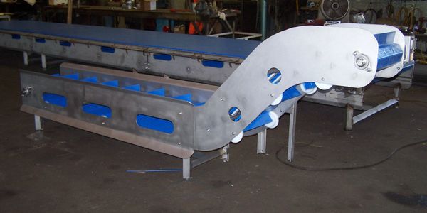 Incline Conveyor - With 40 years in business, contact us for your equipment needs.  