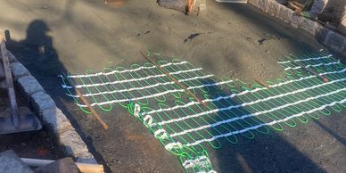 Laying in heat mats under pavers and asphalt