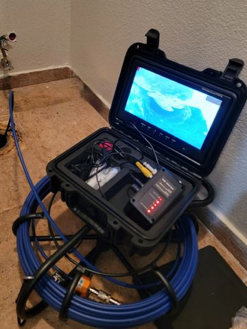 Sewer camera inspection and drain clog locating 