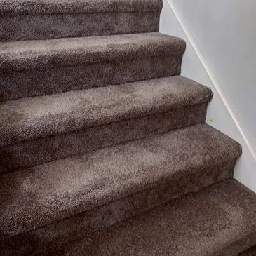 Staircase laid with 100% olefin twist pile carpet heavy duty rated in colour Natural bark