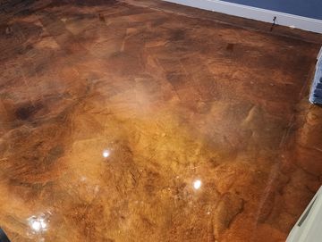 Metallic epoxy in Lowell, MA. Installed in a restored mill building. Many colors to choose from.