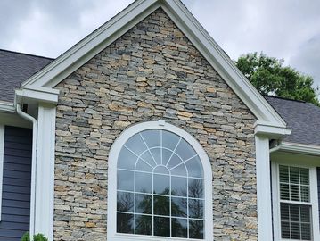 Stone Veneer facade. Color is Boston Blend from stoneyard.com