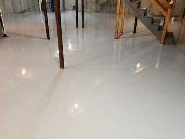 Basement epoxy floor in Winchester, MA. Waterproof and durable resilient flooring.