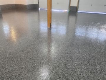 Transform your garage with a durable, slip-resistant flake epoxy floor that looks as good as it perf