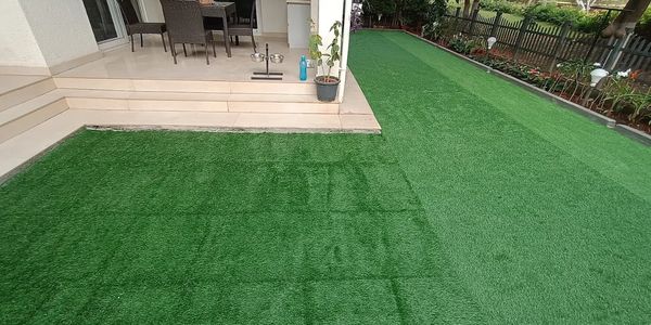 Artificial turf services providing low maintenance green lawns for homes and commercial spaces