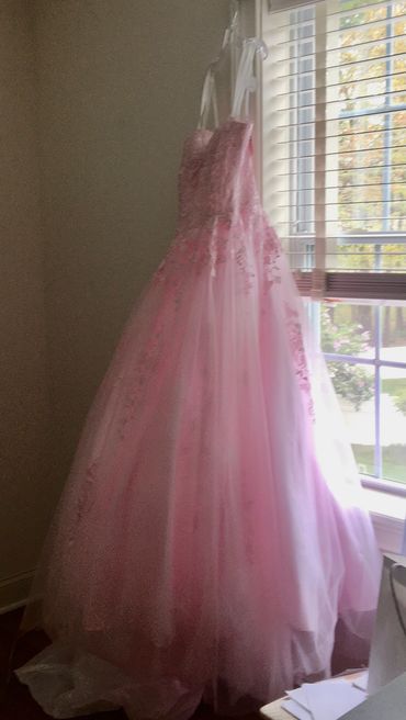 This Cinderella-like gown had 8 layers with an outer skirt that was 9 1/2 yards in circumference! Th