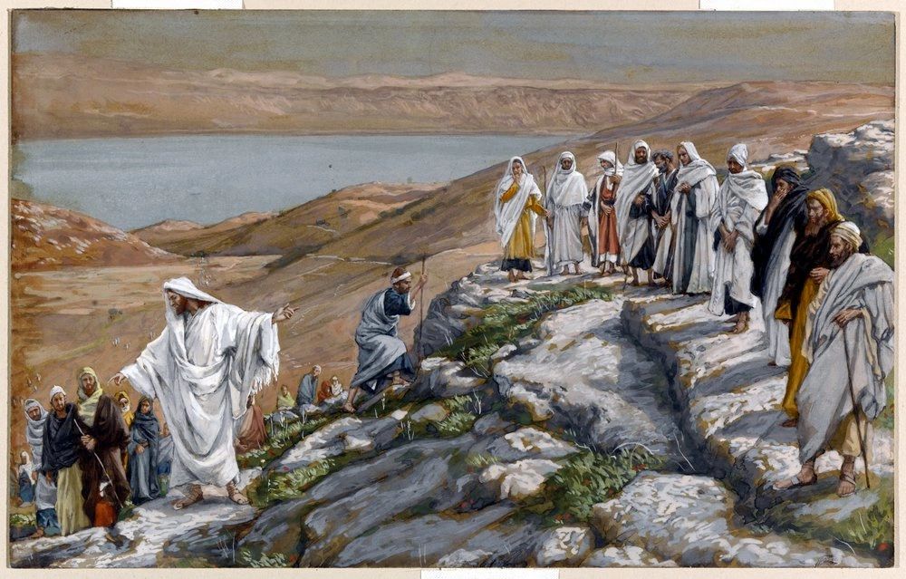A biblical scene with Jesus and his disciples on a rocky hillside.