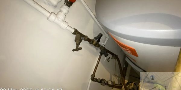 Expansion vessel and safety valve inspection on unvented hot water cylinder system