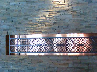 ornamental copper and cast iron grill installation