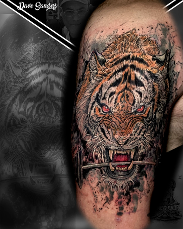Realistic tiger tattoo with detailed fur and colour accents by Hamilton tattoo artist Dave Sanders a