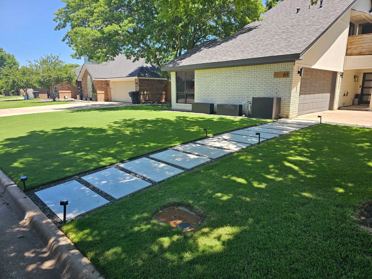 Trimmers Professional Landscaping Full front yard renovation. We tore out all vegitation and started