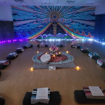 Yoga studio interior showing Matt in a relaxed pose