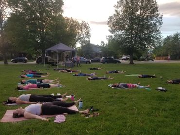 Group of people doing yog On the ground with sleeping and Long breath