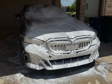 Foam soap on a BMW, during a detail
