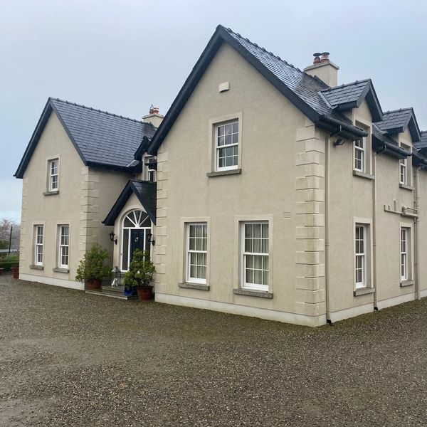 A duplex house with a central entrance