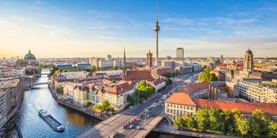 aerial view of berlin skyline and spree river in beautiful evening light at sunset in summer