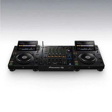 Professional DJ setup with dual turntables and mixer.
