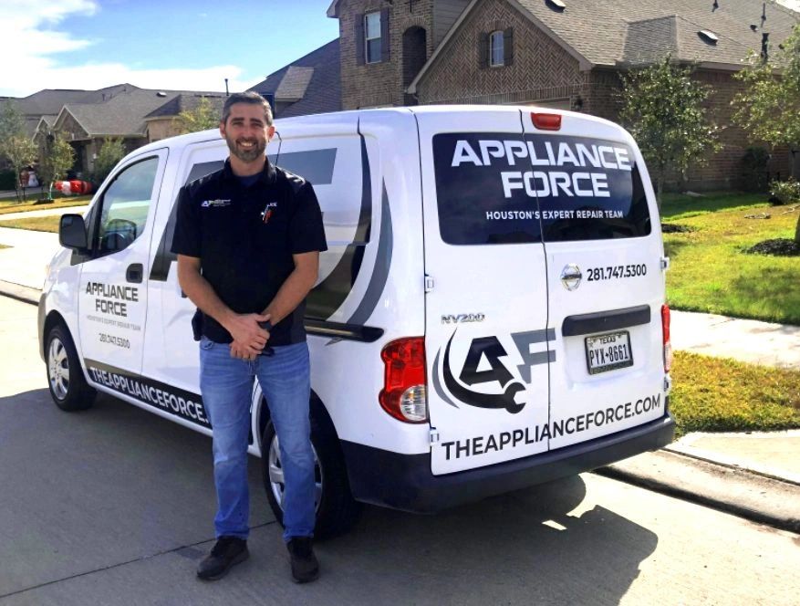 appliance repair team with appliance force joe clark and the appliance force truck