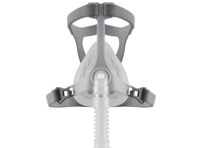 Front view of a gray CPAP mask with headgear and hose connection.