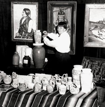 Inez Running-rabbit selling her artwork at the Tulsa State Fair About 1954.