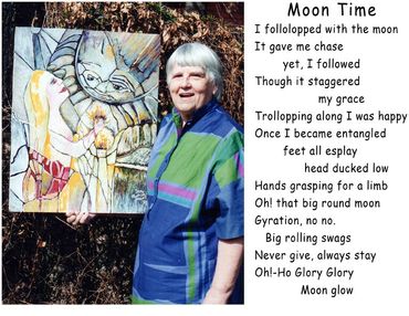 Photo of Inez Running-rabbit holding her painting and her poem "Moon Time".