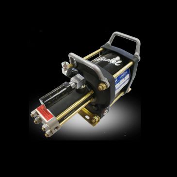 Industrial pneumatic actuator on black background.