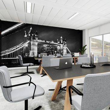 Modern office with London Tower Bridge mural and minimalist furniture.