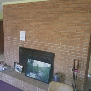 brick fireplace before tv mount