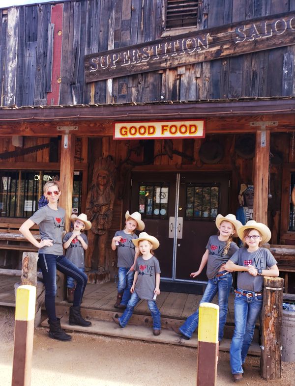 Five girls at a saloon
