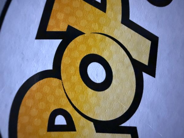 Close-up of the word 'POP' in bold yellow letters.
