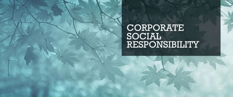 Leaves with text overlay reading Corporate Social Responsibility on a blue background.