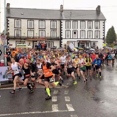 Runners starting off in Man v Horse, Llanwrtyd Wells.