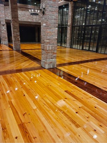 5” Caribbean pine floor with mahogany border at Bayou Rum Distillery by Sonnier’s Hardwood Floors.