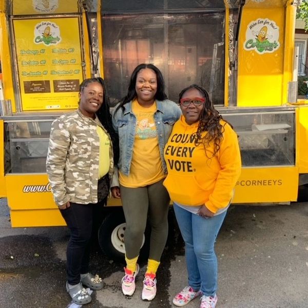 councilwoman kendra brooks and corneeys smiling for a picture