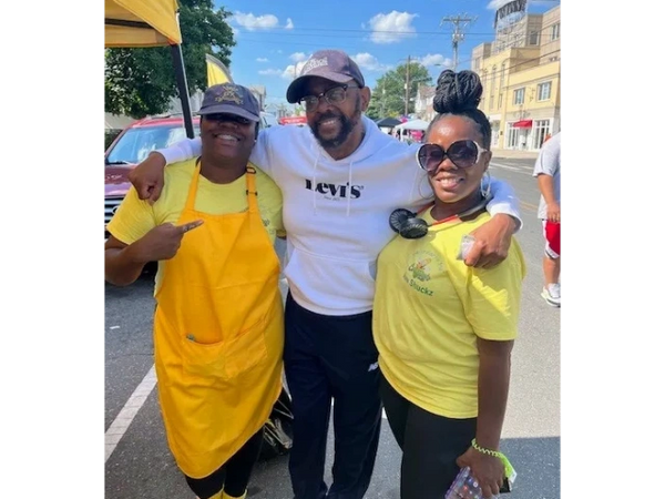 councilman curtis jones and corneey's smiling for a picture