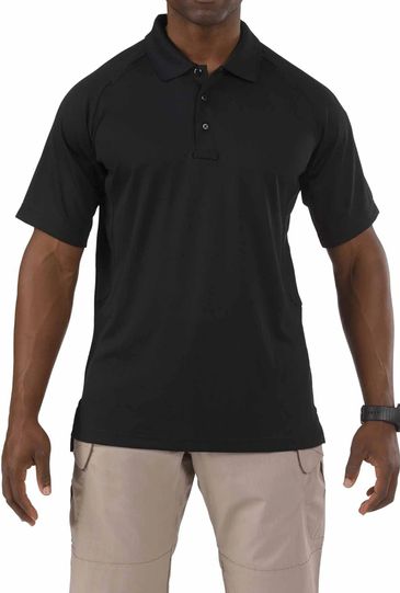 Man wearing a black polo shirt and beige cargo pants.
