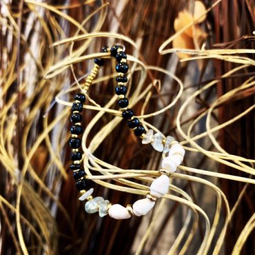 A black and white bracelet.