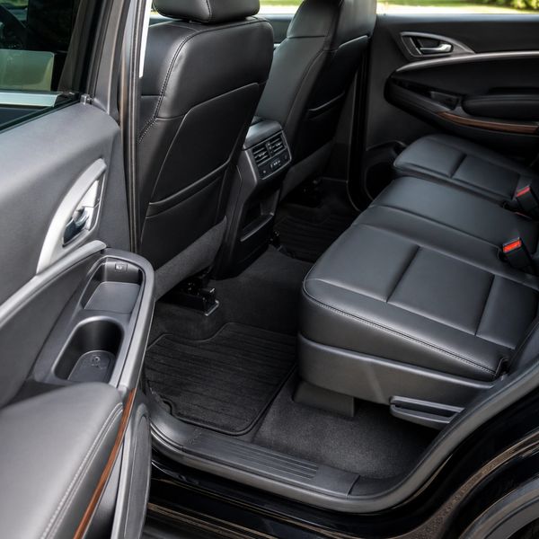 Clean rear SUV interior after professional interior detailing and deep cleaning.