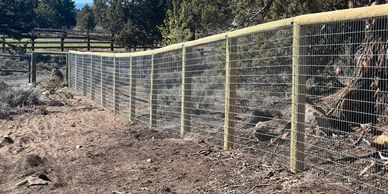 High tensile non climb mesh professionally installed in top rail fence in Central Oregon