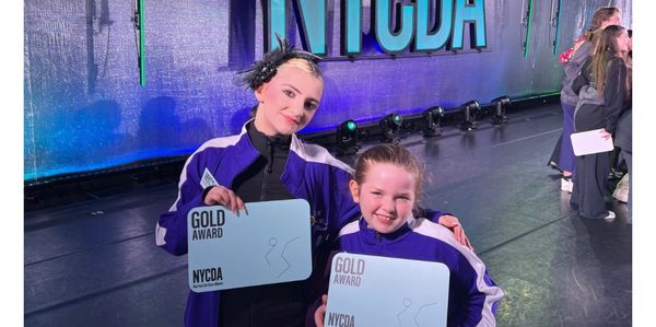 Two Dance Factor company dancers at a dance competition in Savanna, GA