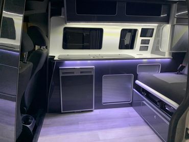 white and grey interior vw caddy camper