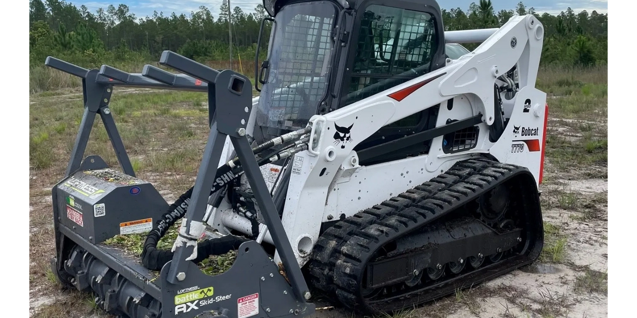 Bobcat T770 With Loftness Battle axe Forestry Mulching head.