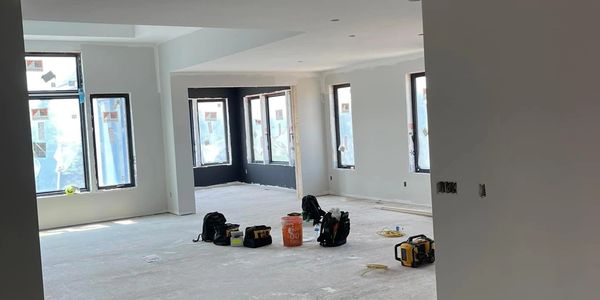 room in house having drywall work done
