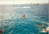 Tom DeBruyckere on Rope Swing during cruise 1989