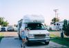 Sandy and our RV home "Cheers" that we traveled from Texas to Alaska, down the west coast and back to Texas 2002