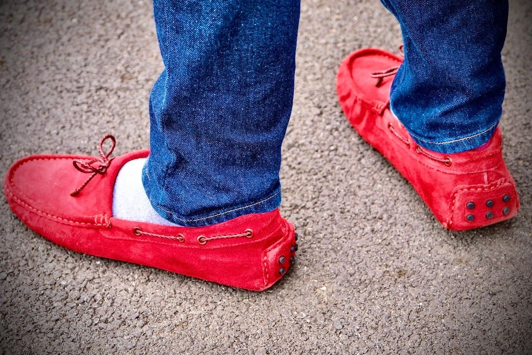 A pair of red suede shoes.