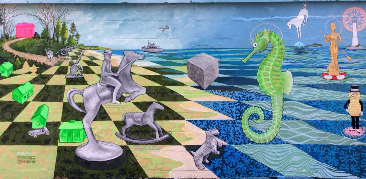 Mural with chess, sea creatures, and game pieces.
