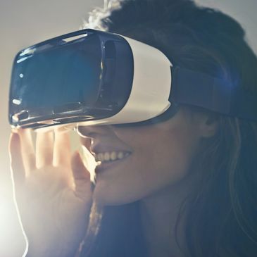 Woman smiling with a VR headset on