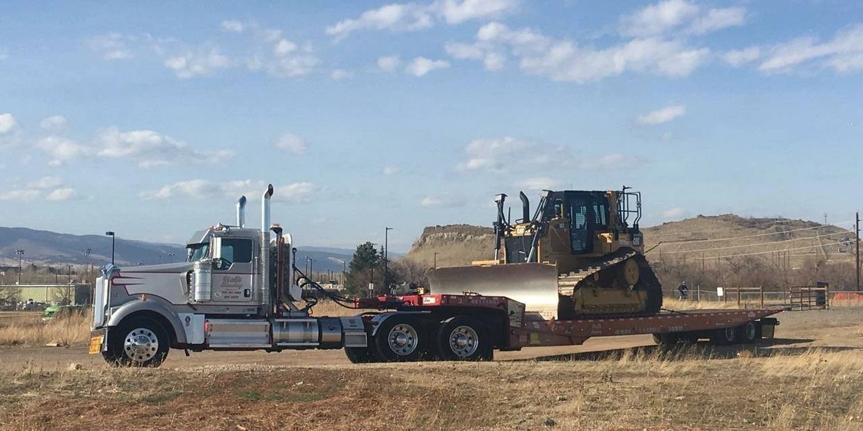 Landoll trailer hauling a dozer